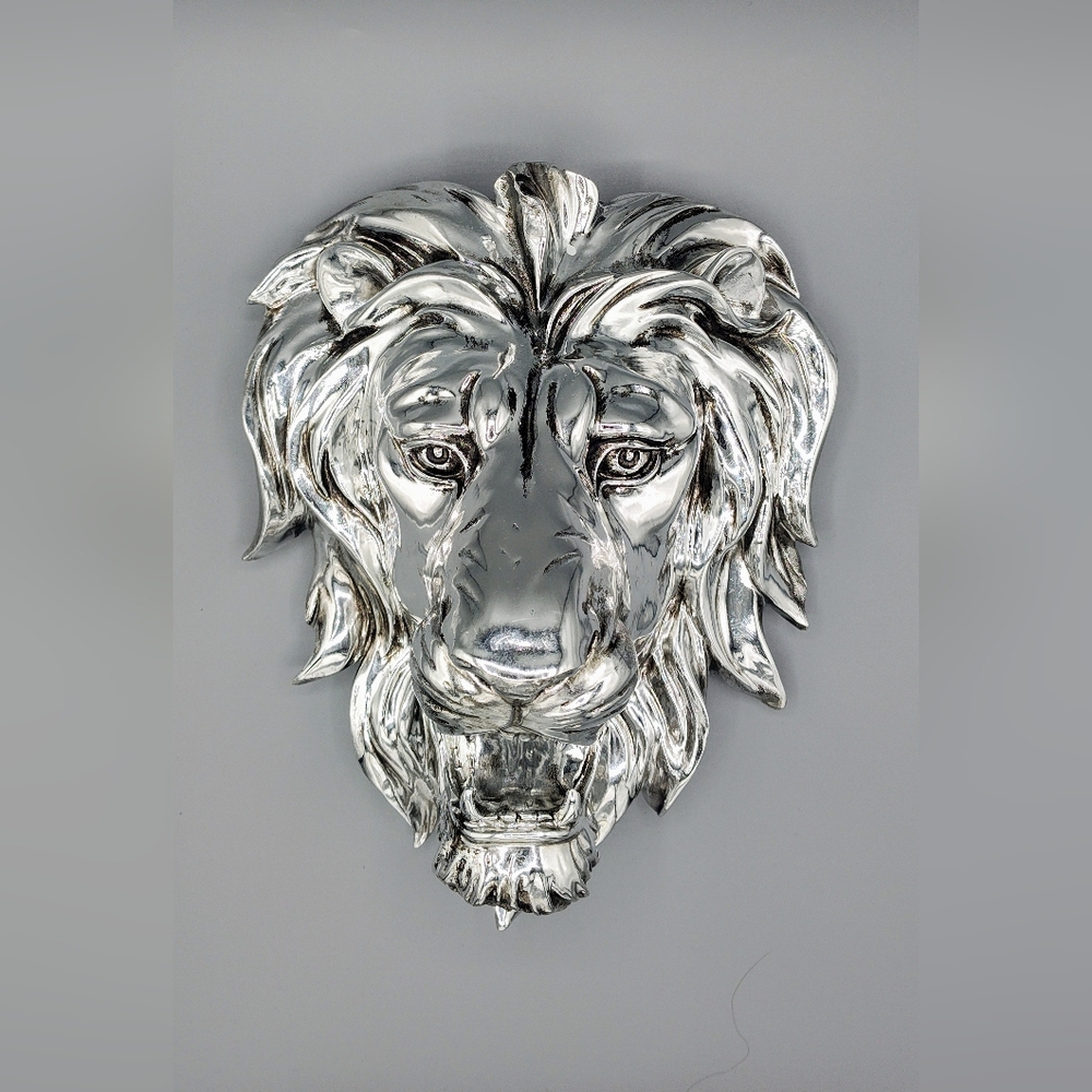 Metallic silver Lion head hanging wall decor.  9"x7"